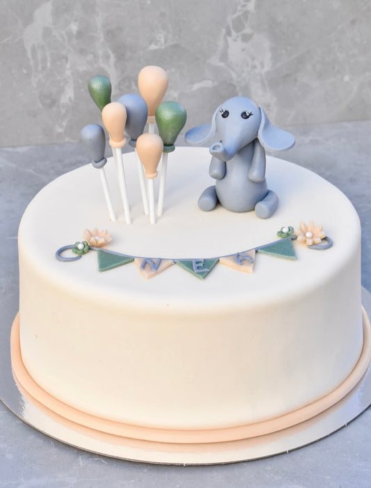 Vit tårta m. elefant & ballonger